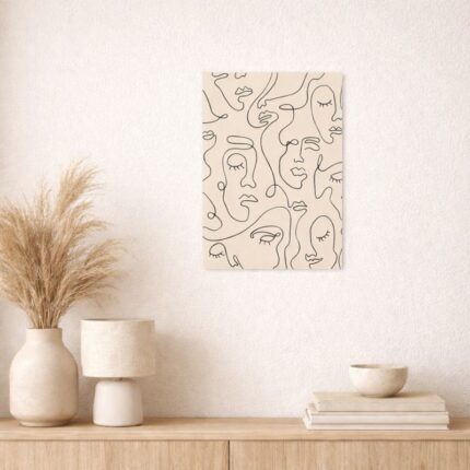 北欧ミニマルなラインで描かれたフェイスモチーフの装飾画