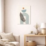 北欧ミニマルなリビング空間に飾られた、アーチラインとリーフモチーフの抽象アート（A3サイズ相当）。