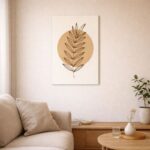 北欧ミニマルなリビング空間に飾られた、ブラウンラインのリーフモチーフ 抽象アート（A3サイズ相当）。