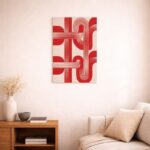 北欧ミニマルなリビング空間に飾られた、レッドラインの北欧ミニマル 抽象アート（A3サイズ相当）。