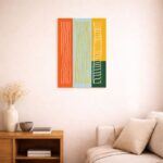 北欧ミニマルなリビング空間に飾られた、カラーストライプの抽象アート（A3サイズ相当）。