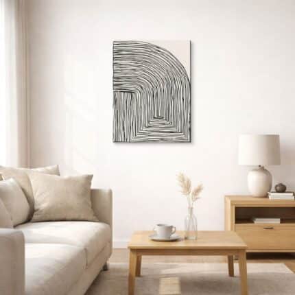 北欧ミニマルな空間に飾られた、ブラックラインのカーブ抽象アート（A3サイズ相当）。