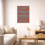 北欧ミニマルな空間に飾られた、ブルーとブラウンのカーブライン抽象アート（A3サイズ相当）。