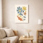 北欧ミニマルなリビング空間に飾られた、カラーフラワーの抽象ボタニカルアート（A3サイズ相当・無フレーム）。