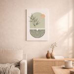 北欧ミニマルなリビング空間に飾られた、ボタニカルラインとアーチフォルムの抽象アート（A3サイズ相当）。