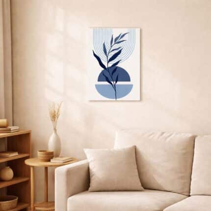 北欧ミニマルなリビング空間に飾られた、ブルーラインとリーフモチーフのジオメトリック抽象アート（A3サイズ相当）。