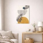 北欧ミニマルなリビング空間に飾られた、サークル構図とリーフラインの抽象アート（A3サイズ相当）。