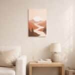 北欧ミニマルなリビング空間に飾られた、夕暮れと渓谷リバーを描いた抽象風景アート（A3サイズ相当）。