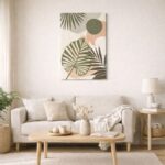 北欧ミニマルなリビング空間に飾られた、リーフモチーフのボタニカル抽象アート（A3サイズ相当）。