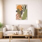 北欧ミニマルなリビング空間に飾られた、サンモチーフとリーフフォルムのボタニカル抽象アート（A3サイズ相当）。