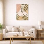 北欧ミニマルなリビング空間に飾られた、サークルラインとボタニカルリーフの抽象アート（A3サイズ相当）。