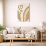 北欧ミニマルなリビング空間に飾られた、アーチラインとリーフモチーフの抽象アート（A3サイズ相当）。