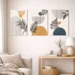 北欧ミニマルな空間に、アーチラインとリーフシルエットの抽象アートを組み合わせて飾ったコーディネート例。