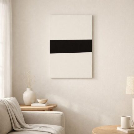 北欧ミニマルなリビング空間に飾られた、ベージュとブラックの水平ライン抽象アート（A3サイズ相当）。