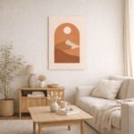北欧ミニマルなリビング空間に飾られたボタニカルアート。サンセットカラーとアーチ形構図が印象的なA3サイズ相当の無フレームポスター。
