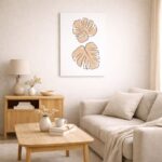 北欧ミニマルなリビング空間に飾られたダブルリーフのボタニカルラインアート（A3サイズ相当）