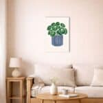 北欧ミニマルなリビングに飾られたグリーンリーフキャンバスアート。