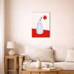 北欧ミニマルなリビングに飾られたレッドフラワーキャンバスアート。