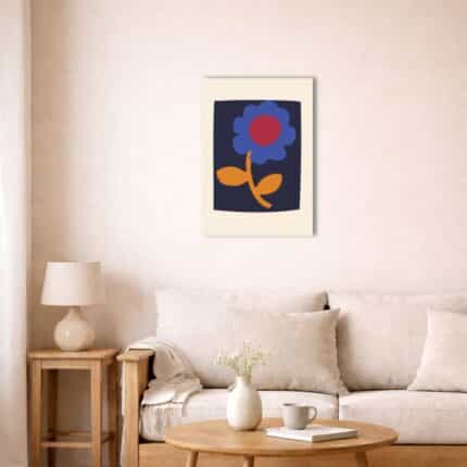 北欧ミニマルな空間に飾られたブルーフラワー抽象キャンバスアート（A3相当）。