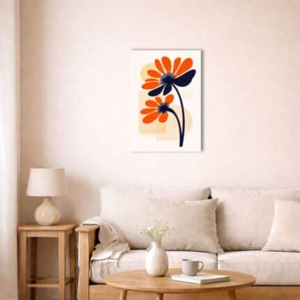 北欧ミニマルなリビングに飾られたオレンジフラワーキャンバスアート。