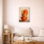 北欧モダン空間に飾られたオレンジジオメトリックキャンバスアート。