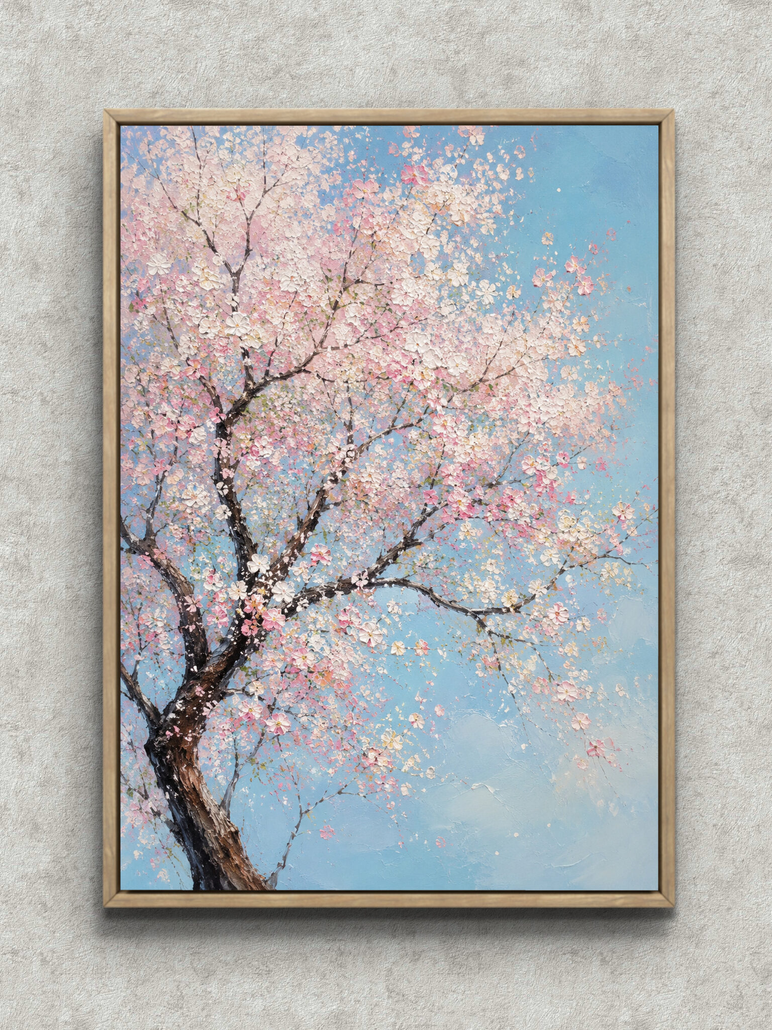 cherry-blossom-sky-interior-art-main-1-ma-10905.jpg 水色の空に淡いピンクの桜が広がる縦構図のフラワーアートパネル フレーム設置イメージ